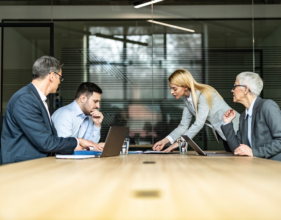a group of people sitting at a table