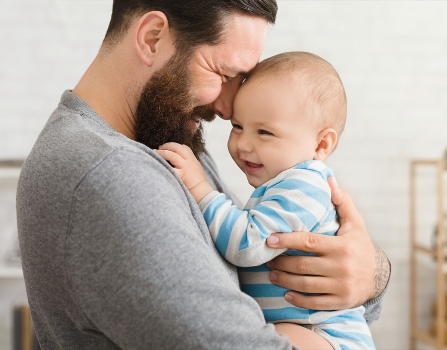 a person holding a baby