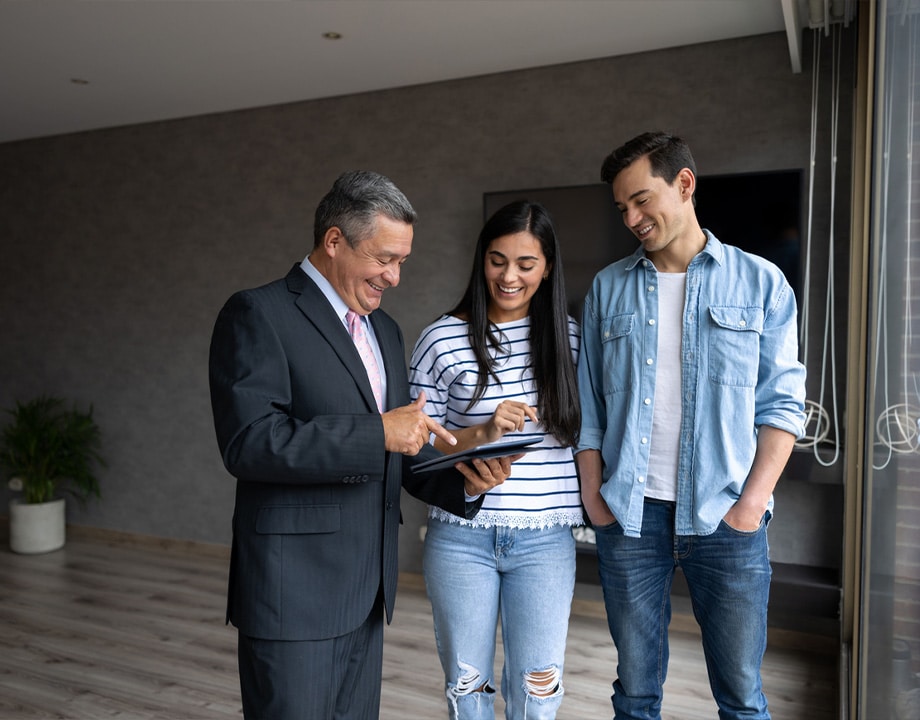 a group of people standing in a room
